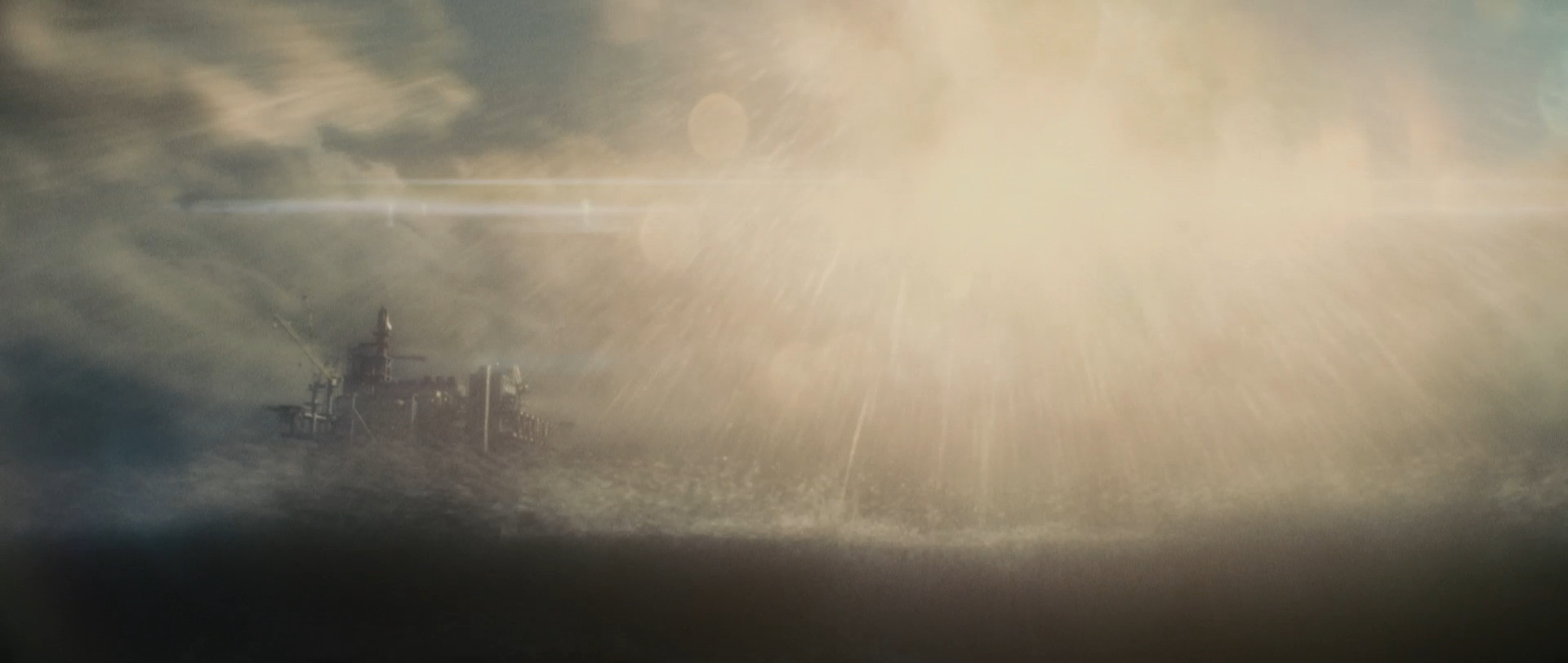 Mothra sải cánh rực rỡ chiếu rọi những luồng hào quang God Rays vàng kim xé toạc màn đêm bão tố ngoài khơi
