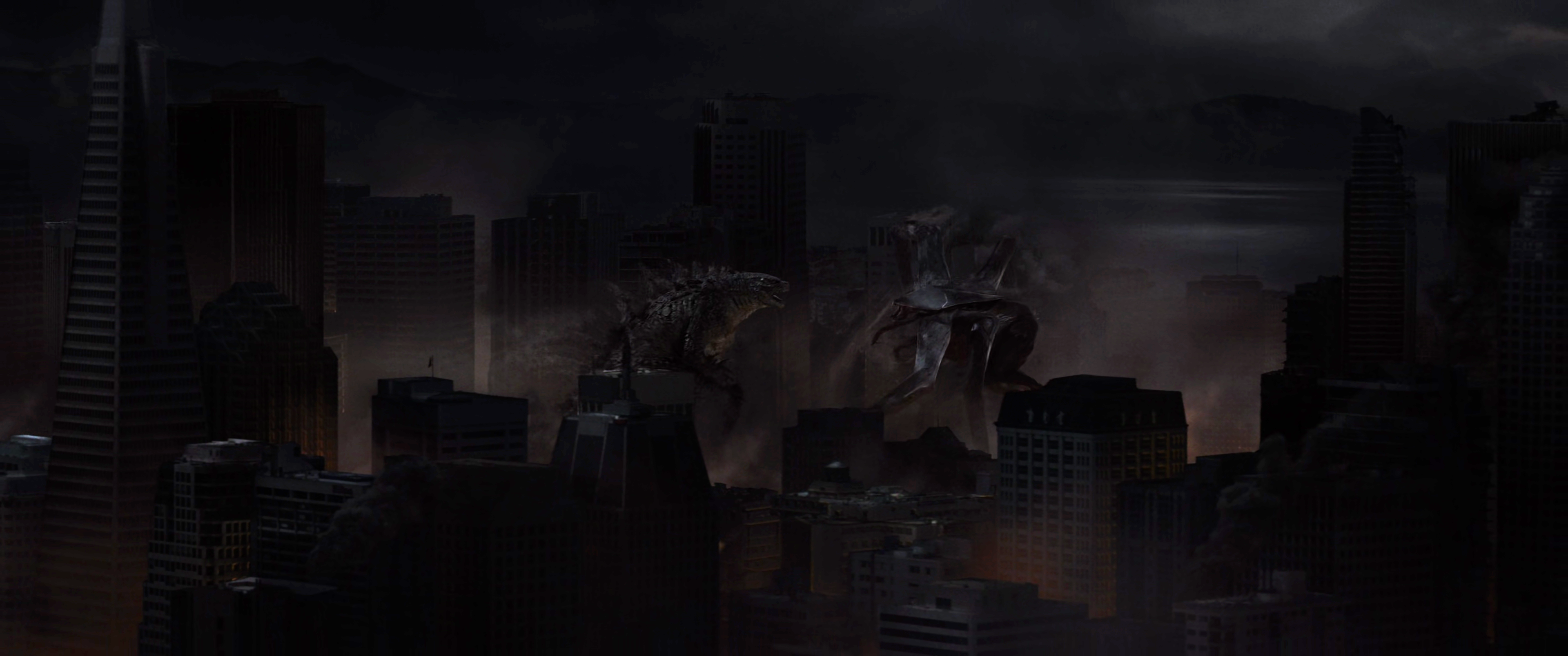 Godzilla nghênh chiến cả MUTO Đực trên không và MUTO Cái dưới đất giữa đống đổ nát San Francisco