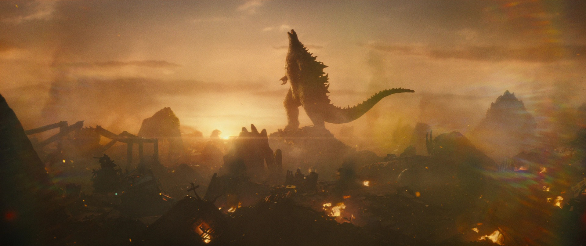 Rodan khép cánh cúi rạp đầu cất tiếng gầm quy phục trước Godzilla giữa đống đổ nát Boston.